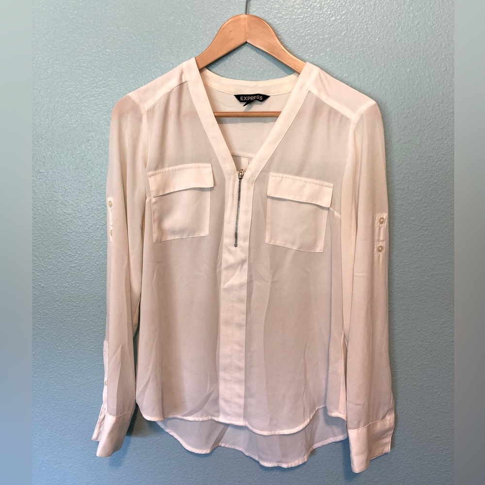 Cream, flowy dress shirt from Express.